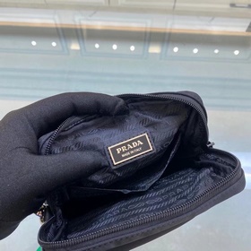 Prada Нейлоновая сумка с отделкой из кожи Saffiano Полированные