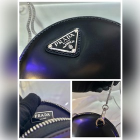 Prada Блестящая круглая сумка для мелочи Артикул： 1NR003 Эта мин