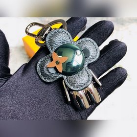 LV MP1990 Зеленый брелок виде подвески виде подсолнуха Стильный и