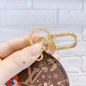 LV круглый брелок Этот изысканный аксессуар для сумкиз классичес