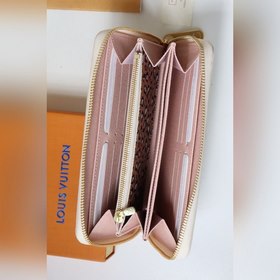 LV Кошелек на молнии Артикул： M80683 Это модель из коллекции Wi