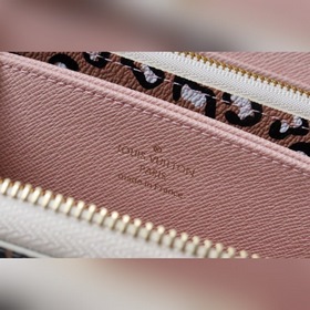 LV Кошелек на молнии Артикул： M80683 Это модель из коллекции Wi