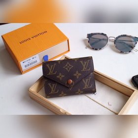 LV Модель M41938 Кошелек VICTORINE Изящный и функциональный, это