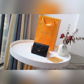 LV Модель M64060 Элегантный и практичный кошелек для мелочи Этот 