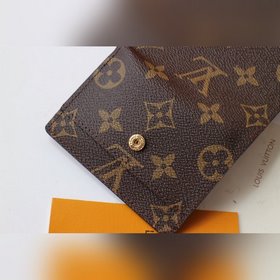 LV Модель M68704 MICRO Кошелек Этот компактный кошелек Micro из 