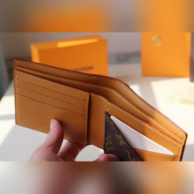 LV MUL TIPLE Кошелек Модель M69024 Короткий кожаный кошелек из ко