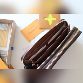 LV Двойной кошелек на молнии Модель M61723  Этот чрезвычайно пра