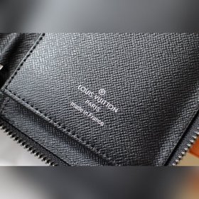 LV Модель N63095 Черный цветок ZIPPY VERTICAL Кошелек Этот вертик