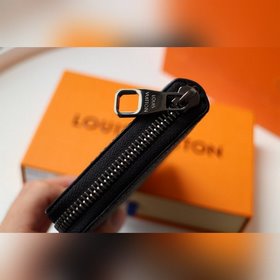 LV Модель N63095 Черный цветок ZIPPY VERTICAL Кошелек Этот вертик