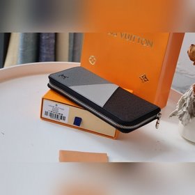LV ZIPPY VERTICAL Кошелек Артикул： M63095 Этот вертикальный мужс