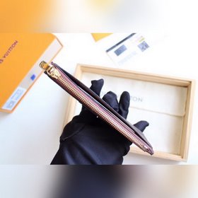 LV Модель M64038 Кошелек для монет Высочайшее качество Этот коше