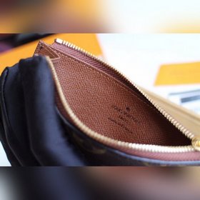 LV Модель M64038 Кошелек для монет Высочайшее качество Этот коше