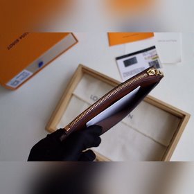 LV Модель M64038 Кошелек для монет Высочайшее качество Этот коше