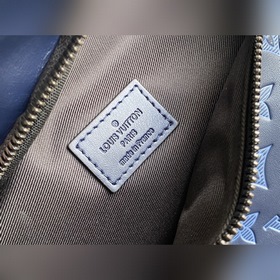 LV Артикул： M45729 Поясная сумка Discovery Изготовлен из телячь