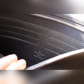 LV POCHETT VOYAGE сумочка Модель M30395, черный Pochette Voyage 