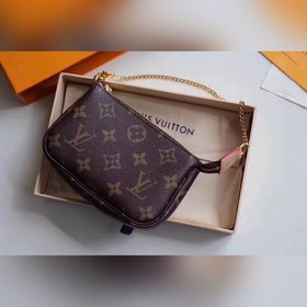 LV MINI POCHETTE ACCESSORIES Маленькая сумка Модель N58009 Эта