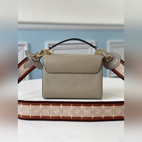 LV Артикул： M57049 Маленькая сумка Twist из кожи Epi Широкий пл
