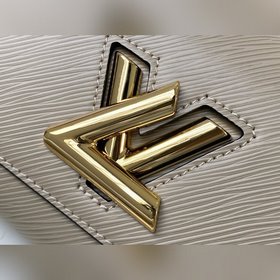 LV Артикул： M57049 Маленькая сумка Twist из кожи Epi Широкий пл