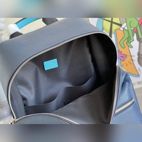 Рюкзак M30359 Discovery темно-синего цвета украшен тисненым логот