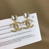 Серьги Chanel.