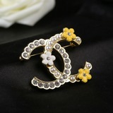 Chanel осенне-зимняя коллекция. Брошь в виде цветочной косы с бриллиантами. Изыс