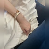 Новая модель браслета Dior в белом и черном цвете, который может быть как сладки