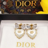 Новые серьги-бабочки с бантиком от Dior.