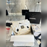 Размер 40,25. Сумка Chanel из винтажного полотна с косой ручкой легко сочетается