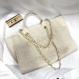 Chanel 2023 Новая модель маленькой сумки из плетеного полотна с вышивкой, пляжна