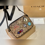 Складная сумка для фотоаппарата размером 25*17 см от Coach, вместительная и очен