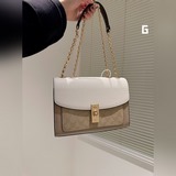 Складная коробка с герметичной упаковкой. Большая сумка Coach Lane с цепочкой. К