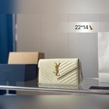YSL WOC черная сумка с цепочкой в форме конверта. Это классическая модель для на