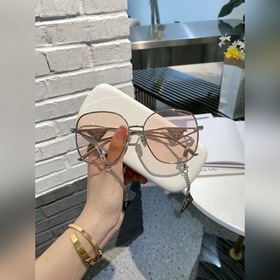 Prada Солнцезащитные очки Prada Девочка розовый Подвеска с бахр