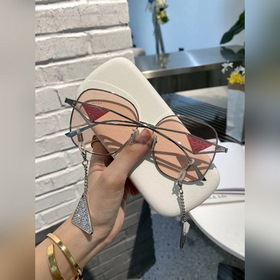 Prada Солнцезащитные очки Prada Девочка розовый Подвеска с бахр