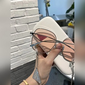 Prada Солнцезащитные очки Prada Девочка розовый Подвеска с бахр